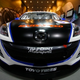 Illustration for article titled Shiny Happy Track Stars: The Mazda 3 World Challenge Car